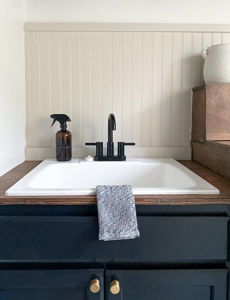 DIY Laundry Room Renovation - Plywood countertops, drop in sink, headboard and new floor tile